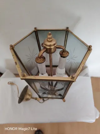 Farol de metal y cristal