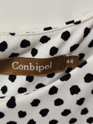 Abito Conbipel pois bianco e nero.