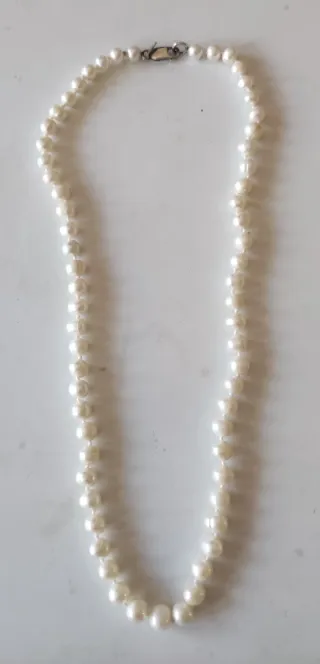 Collares y pendientes perlas de río y plata