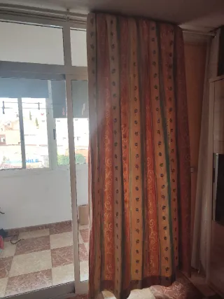 Cortinas beige y naranja