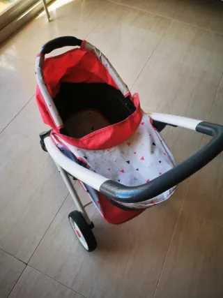 Cochecito de juguete para muñecas