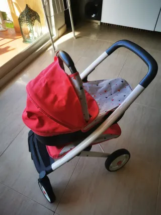 Cochecito de juguete para muñecas