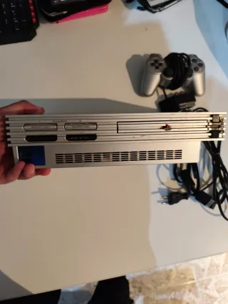 PlayStation 2 Plateada Funcionando