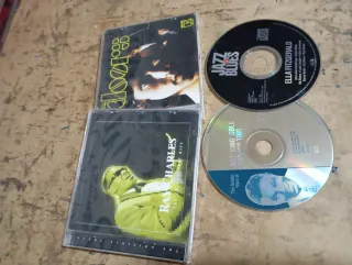 CD the Doors,ray charles,ella fitzgerald y nat kin