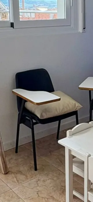 Sillas de academia con pala de escritura