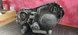 Faro izquierdo 154360-00 734857-02 Mercedes