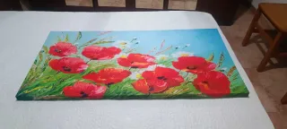 Cuadro de flores rojas y margaritas