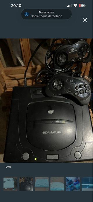 Sega Saturn Negra con mandos