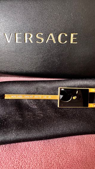 Gafas de sol Versace doradas y negras