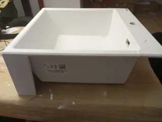 Pica cocina Corian blanco sobre encimera