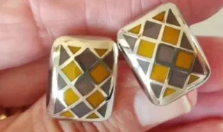 Gemelos, broche y llavero de plata