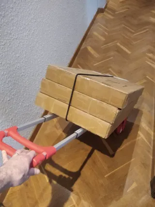 Carretilla de transporte plegable y ligera.