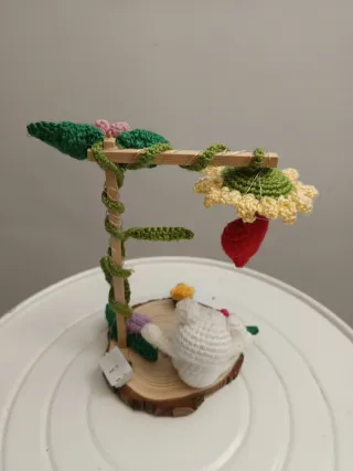 Osito de peluche con corazón y flor