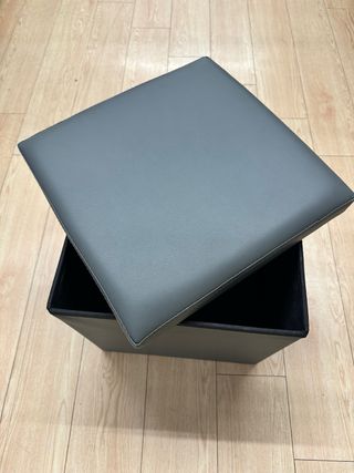 Taburete de almacenamiento gris y negro