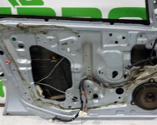 Puerta del izq nissan 801015m432 almera 1.5 113501