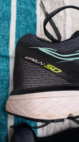 Zapatillas running Kalenji negras y turquesa