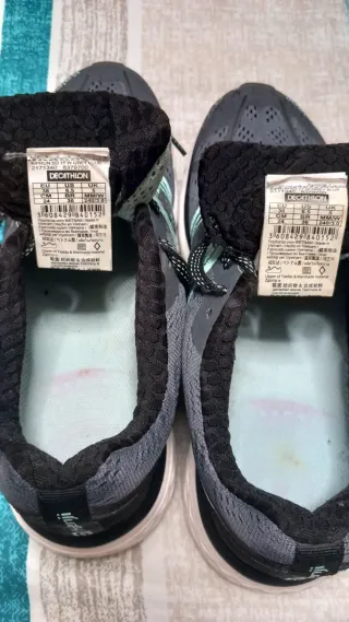 Zapatillas running Kalenji negras y turquesa