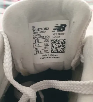 Zapatillas New Balance 574 Plata y Blanco