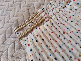 Falda larga plisada con estrellas