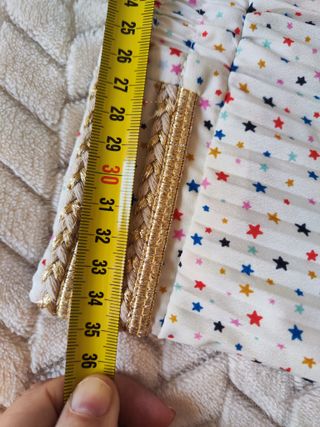 Falda larga plisada con estrellas