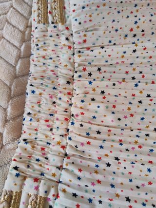 Falda larga plisada con estrellas