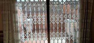 Reja extensible  corredera de seguridad 2'00 ancho