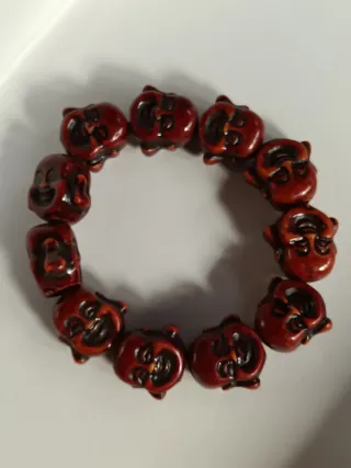 Bracciale con teste di Buddha in pietra