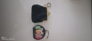 Monedero y espejo