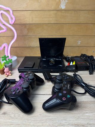 PS2 Slim nera con 2 controller e accessori