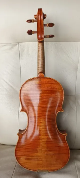 Violín.