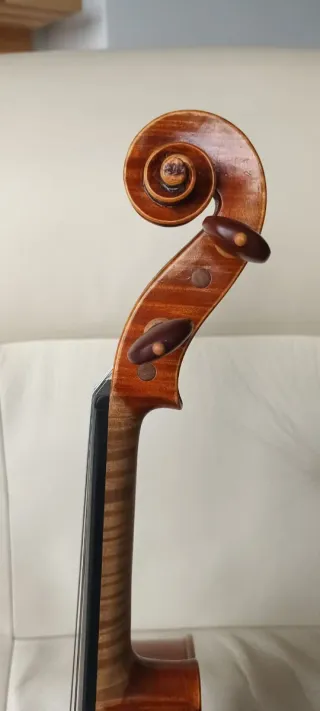 Violín.