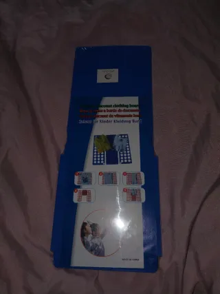 Tabla para doblar ropa infantil