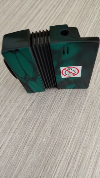 Accendino a forma di fisarmonica