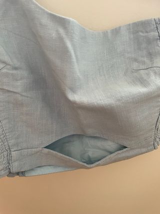 Top asimétrico abullonado