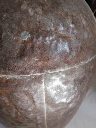 Aceitera antigua de metal