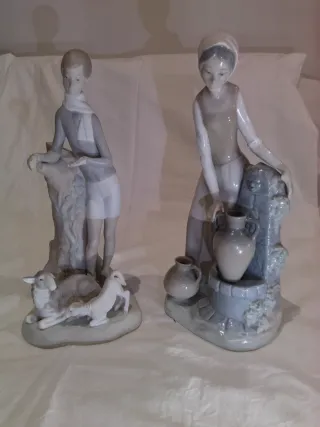 Lladro NAO niño con corderos y niña