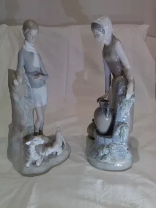 Lladro NAO niño con corderos y niña