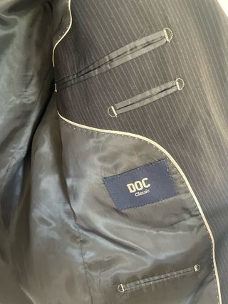 Americana azul oscuro a rayas