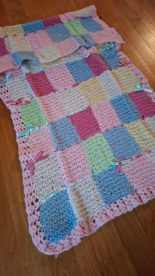 Copertina culla lana patchwork fiocchi