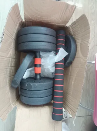 Juego de pesas con discos y barra