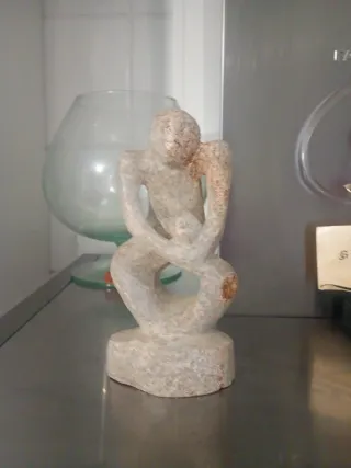 Figura decorativa de piedra