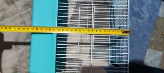 Jaula para pájaros azul y turquesa