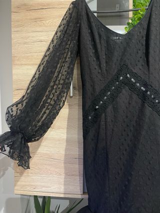 Traje de flamenca negro volantes