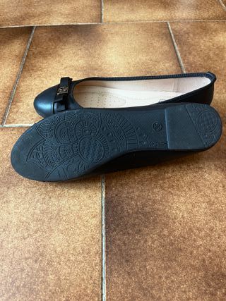 Ballerine nere eleganti con fiocco