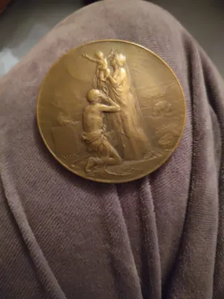 Medalla antigua de cobre