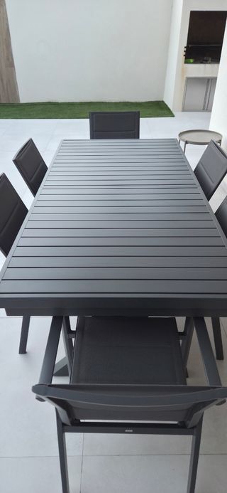 Conjunto mesa y sillas jardín.