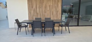 Conjunto mesa y sillas jardín.
