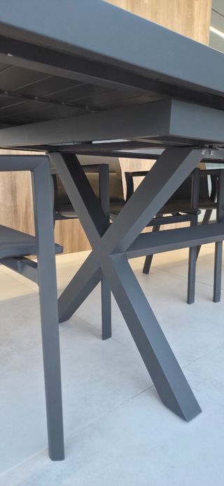 Conjunto mesa y sillas jardín.