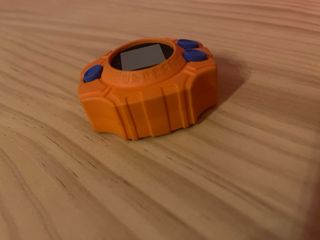 Digivice y Emblema Valor