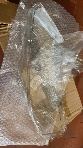 Cubierta Faro Delantero Derecho VW Passat 05>